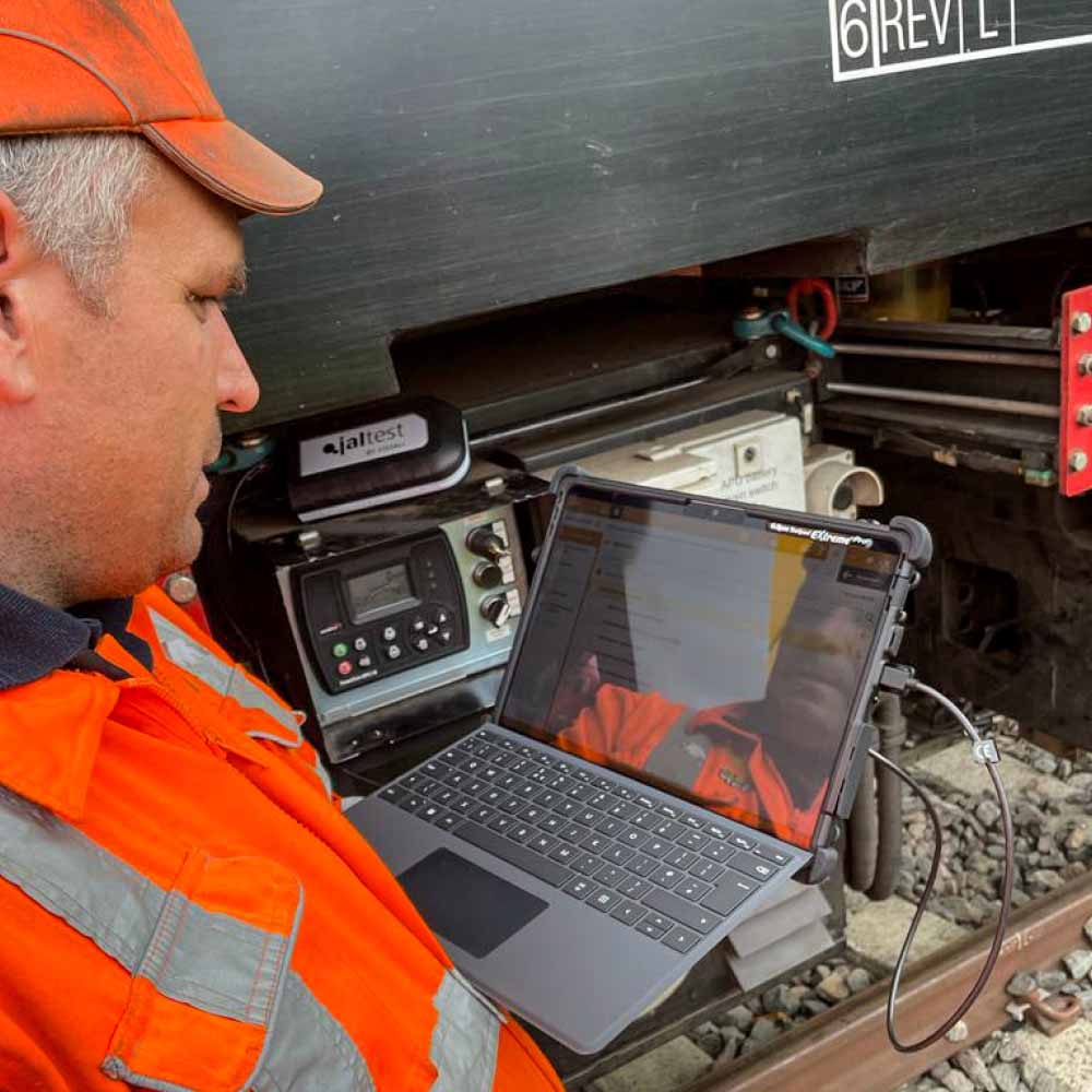 Man using Jaltest's train diagnostics software