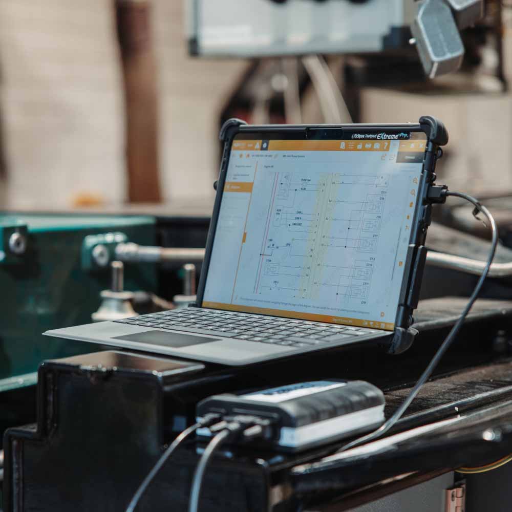 Laptop showing vehicle diagnostic software by Jaltest
